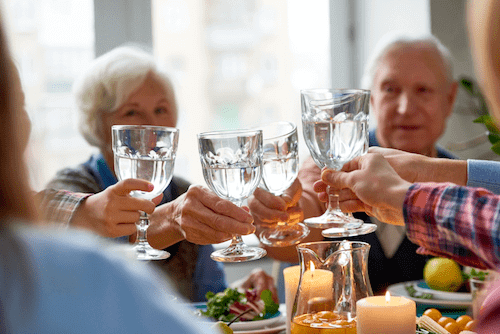 Seniors avoiding dehydration by drinking water