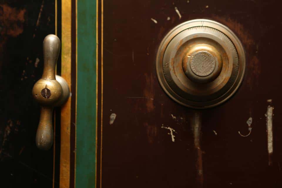 An old-fashion safe with brass handle and a combination lock