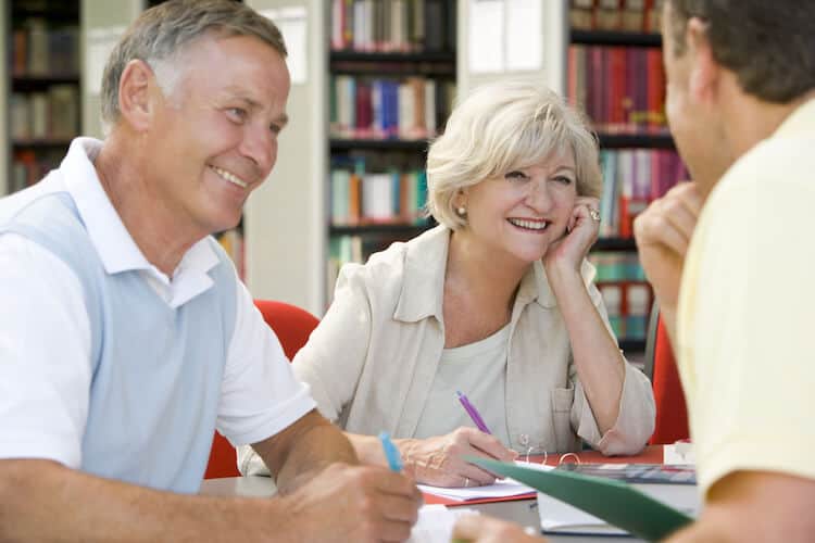 A group of seniors in the library.