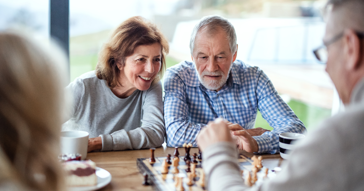 Two couples playing chess